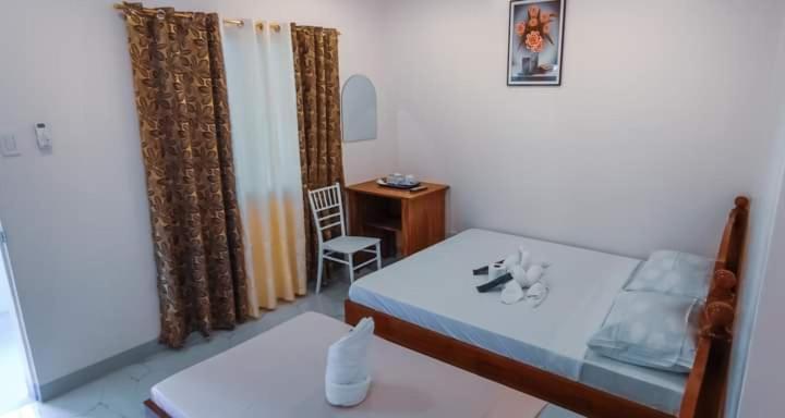 Elnora Delmar Travellers Inn Siquijor Extérieur photo