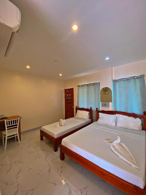 Elnora Delmar Travellers Inn Siquijor Extérieur photo